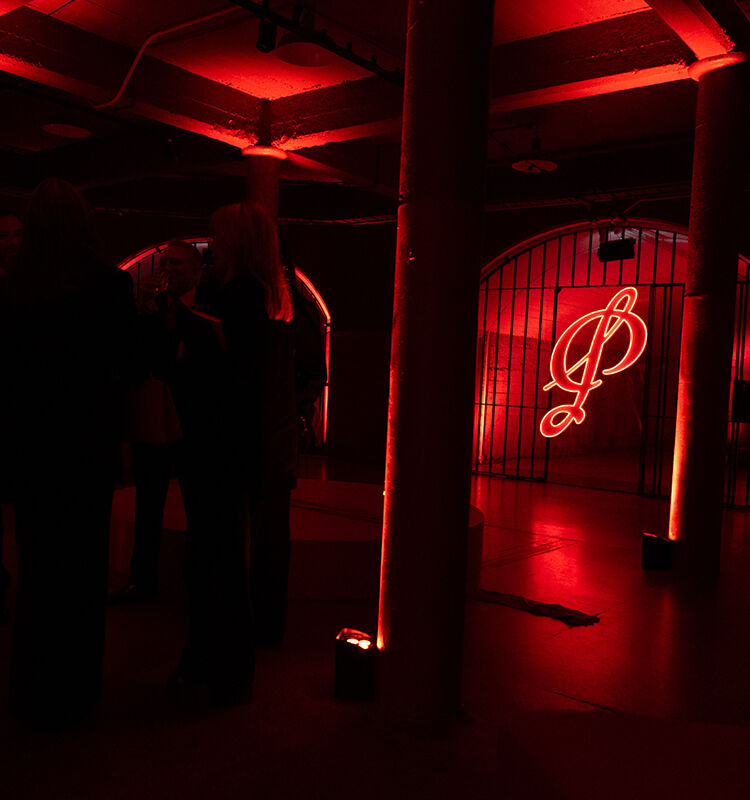 Penfolds logo amidst red lights
