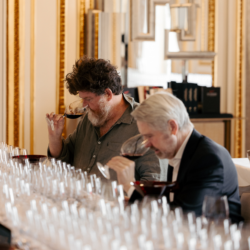 Wine critics tasting wine