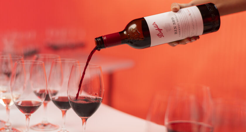 Bin 389 being poured into glass.