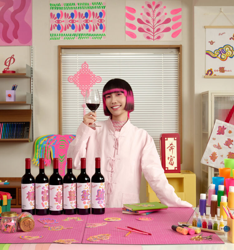 Chen Fenwan alongside designed Penfolds wines